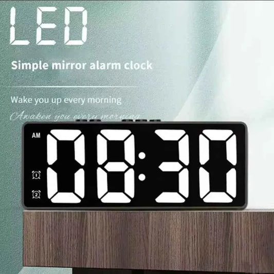 LED digital alarm clock with large numbers and mirror finish for easy visibility in any room