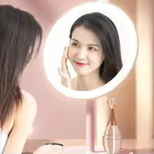Clarify.pk led makeup mirror with light showing a woman applying makeup with clear reflection
