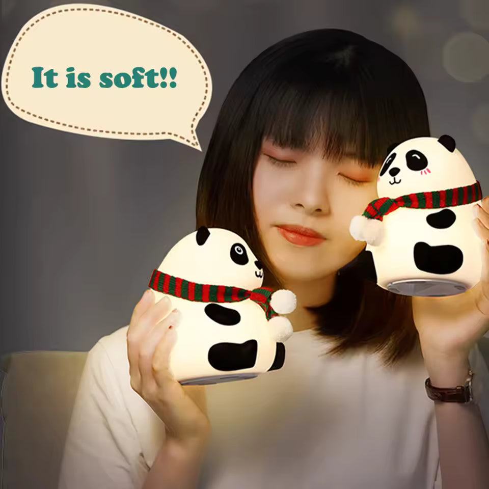 Cute silicone panda lamp night light held by woman showcasing its soft texture and cozy design