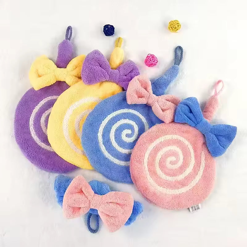 Soft colorful lollipop design bathroom towel with bow accents in pastel shades for kids