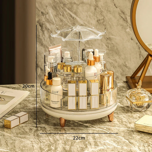 Clarify.pk 360 degree makeup organizer with clear rotating compartments for storing cosmetics on marble countertop