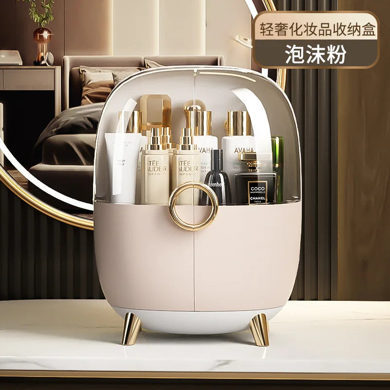 Clarify.pk luxury cosmetics storage box in beige with clear dome lid and gold accents on marble table