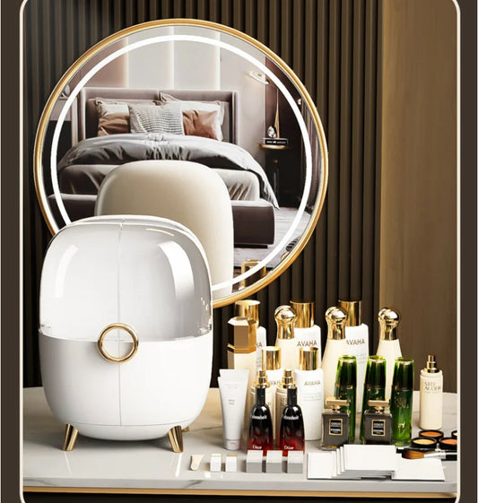 White and gold luxury cosmetics storage box on vanity table with skincare and makeup products