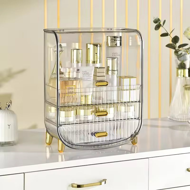 Luxury makeup storage box with transparent design and gold accents for organized cosmetics