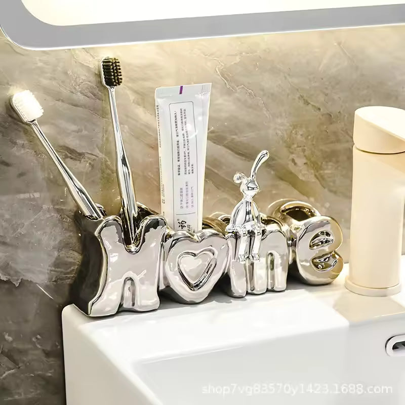 Luxury toothbrush holder for bathroom in silver with love design holding toothbrushes and toothpaste