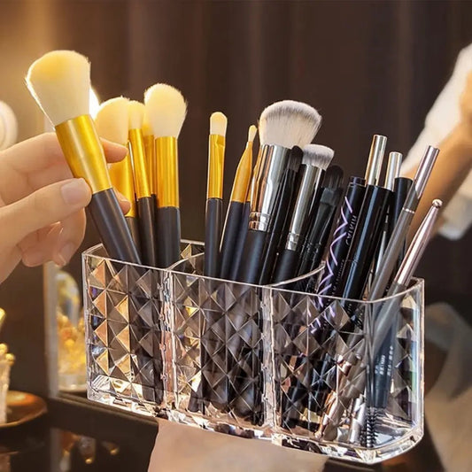 Clear cosmetic storage box holding various makeup brushes and pencils makeup brush bucket for vanity