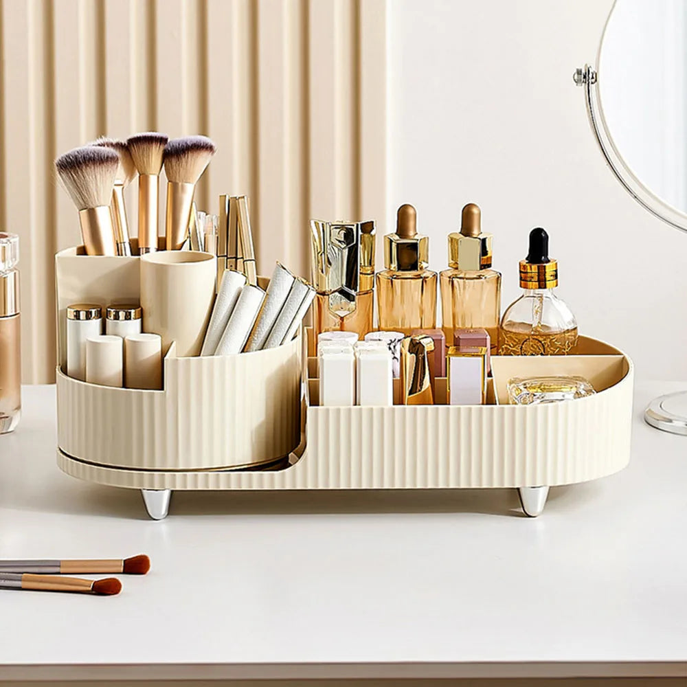 Beige makeup organizer for vanity with multiple compartments holding brushes and bottles on a white table