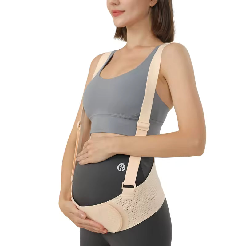 Pregnant woman wearing Clarify pk beige maternity pregnancy support belt for pain with adjustable shoulder straps