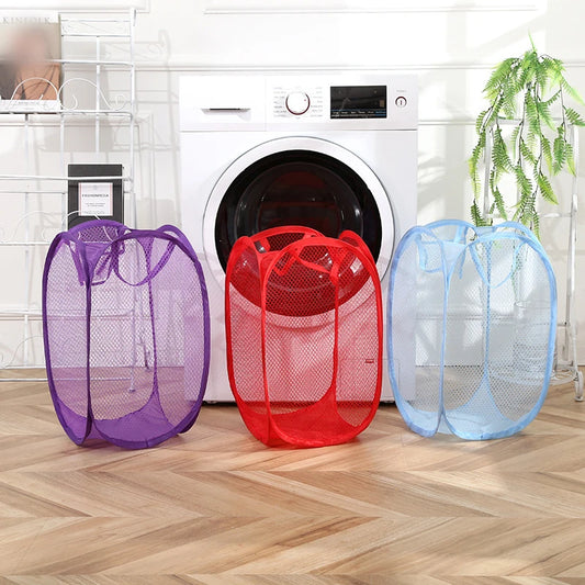 Clarify.pk mesh foldable laundry basket set in purple red and blue near washing machine