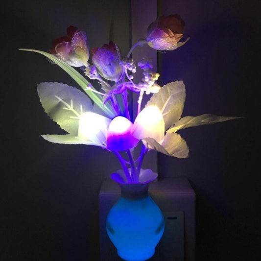 Clarify.pk mini LED night lamp shaped like glowing flowers in a blue vase glowing in the dark