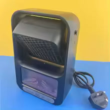 Black Clarify.pk mini portable room heater with power cord and plug on blue surface