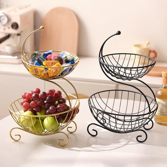 Clarify.pk modern fruit basket stand in gold and black metal with two-tier storage holding fruits and snacks