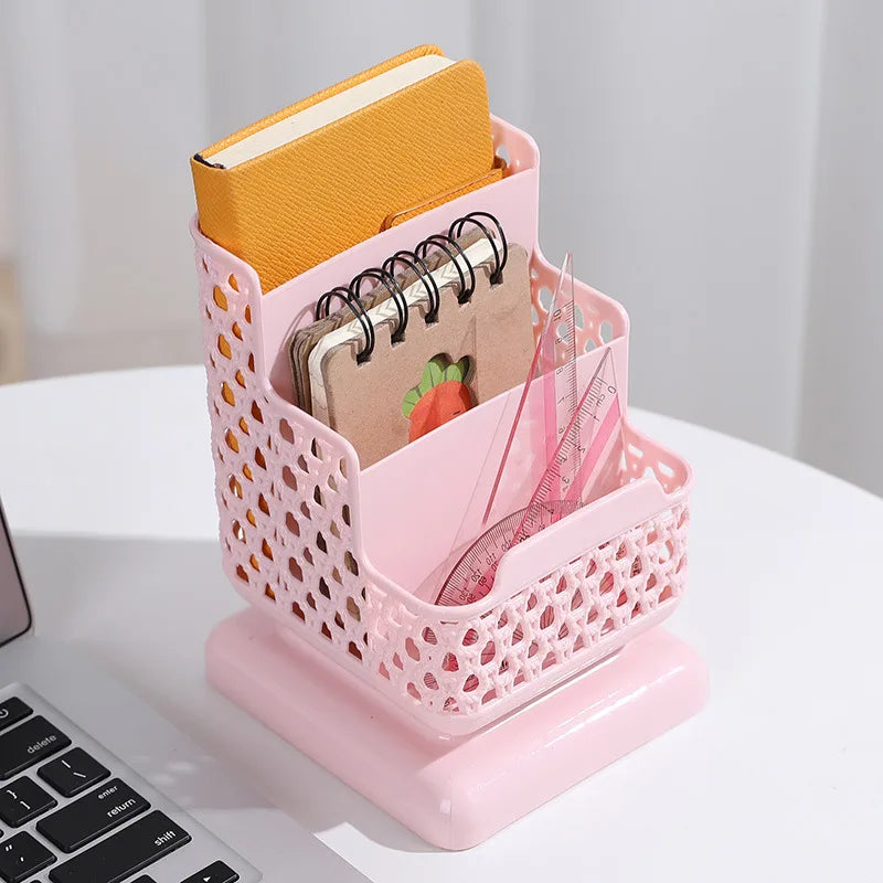 Clarify.pk pink multi compartment desk organizer holding notebooks rulers and pens on white table