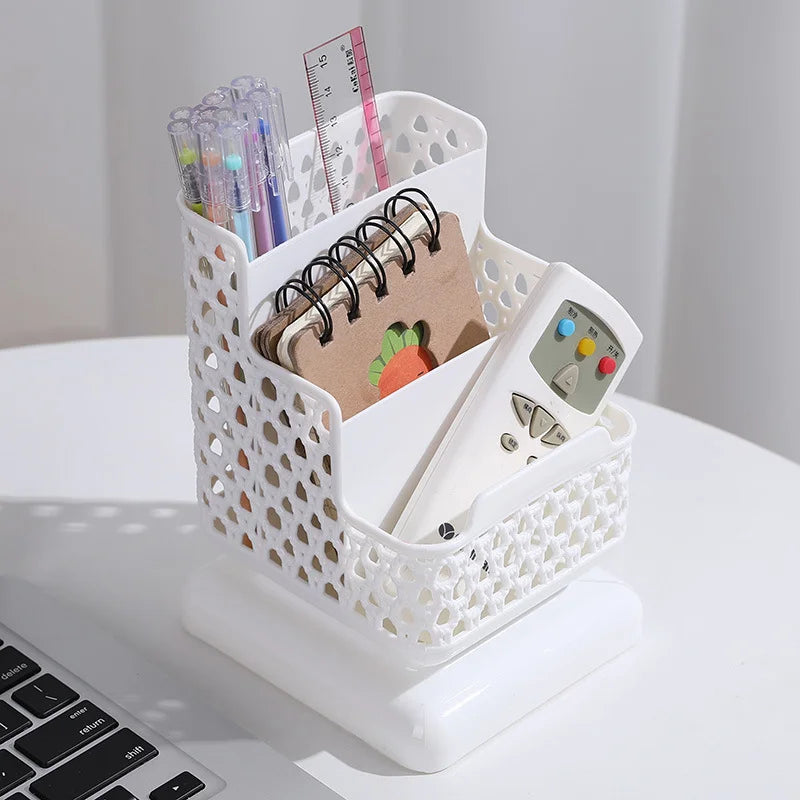 Clarify.pk multi compartment desk organizer in white holding pens, ruler, notebook, and remote