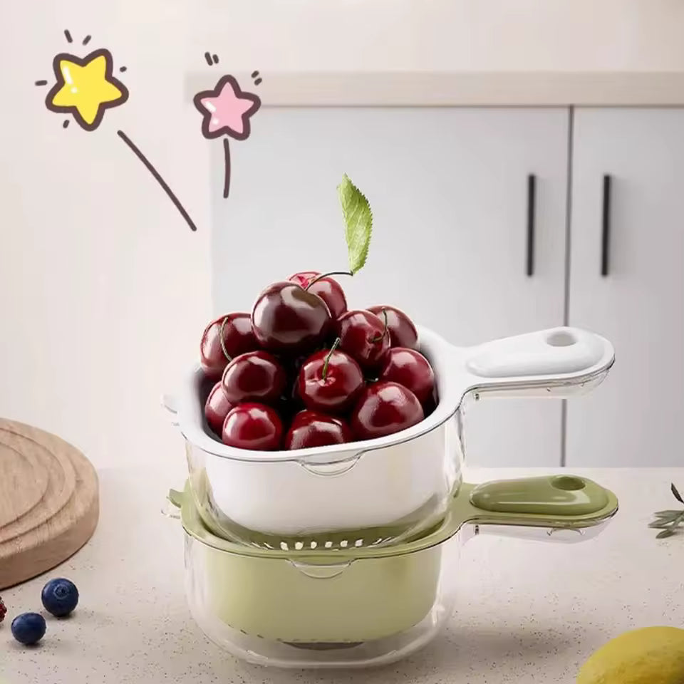 Multi-functional drain basket by Clarify.pk holding fresh cherries in a modern kitchen setup