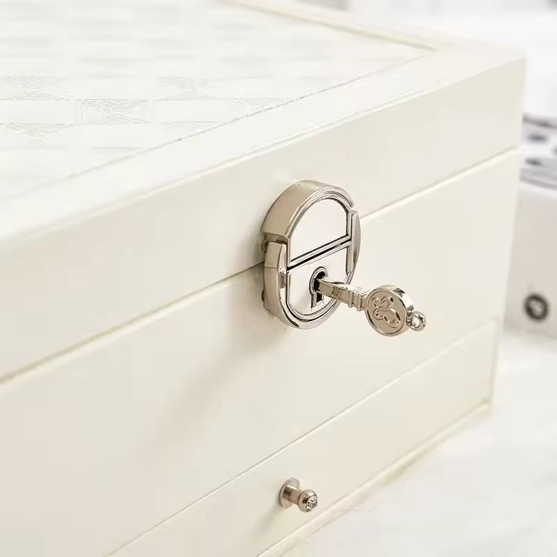 White multi-layer jewelry storage case with silver lock and key by Clarify.pk
