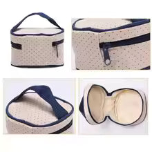 Clarify.pk multifunctional maternity handbag with beige polka dot fabric and navy blue accents