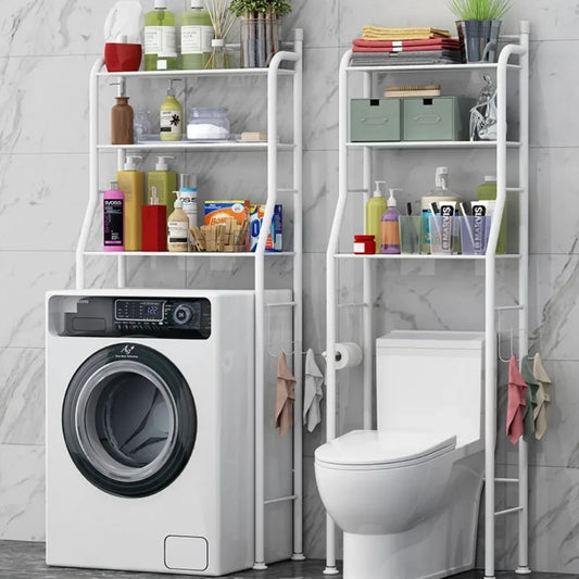 White multifunctional toilet rack installed over washing machine and toilet for bathroom organization