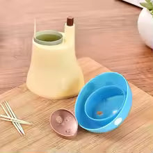 Clarify.pk mushroom toothpick holder in blue and beige with removable parts on wooden surface