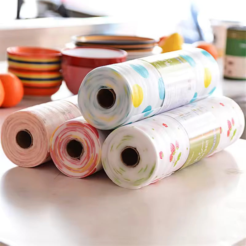 Rolls of colorful non-slip cabinet mat for drawers with various patterns on a kitchen countertop