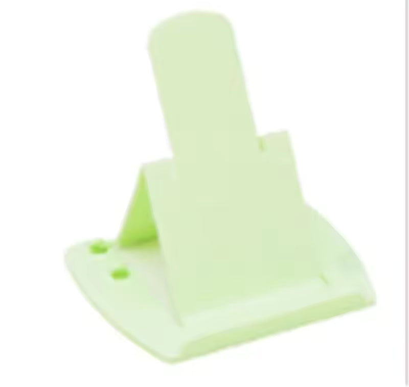 Light green cell phone stand holding a smartphone featured in pack of 4 cell phone stands