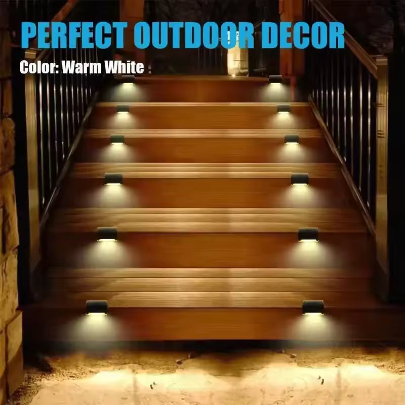 Pack of 4 solar led staircase lights outdoor installed on wooden stairs with warm white light