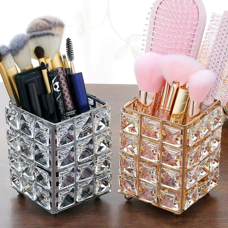Crystal makeup brush holder set with clear and gold decorative candle holders for organizing beauty tools