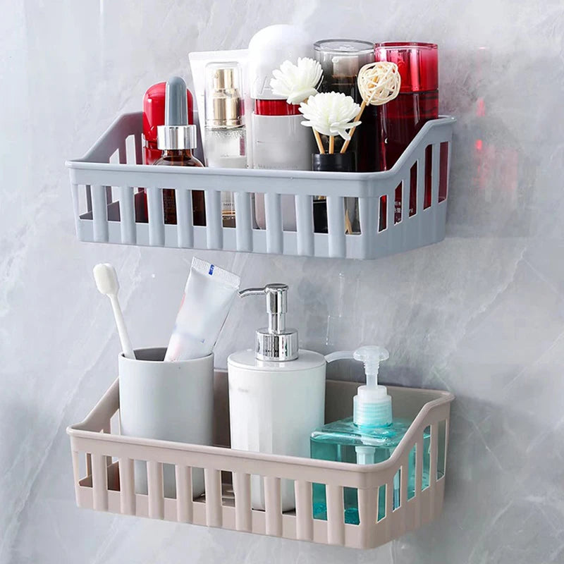 Gray and beige plastic bathroom shelf organizer mounted on wall holding toiletries and cosmetics