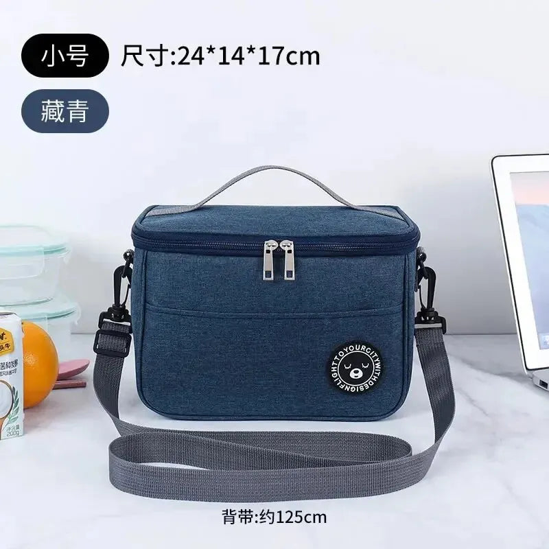 Clarify.pk portable insulated lunch bag in blue Oxford cloth with shoulder strap and zipper closure