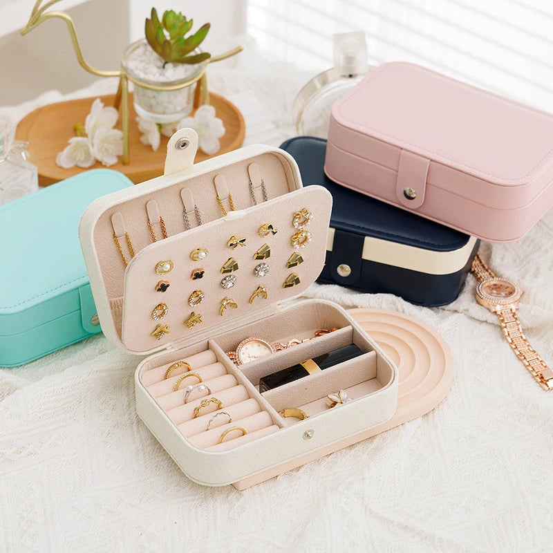 Clarify.pk portable jewelry storage box in beige with ring, earring, and necklace compartments