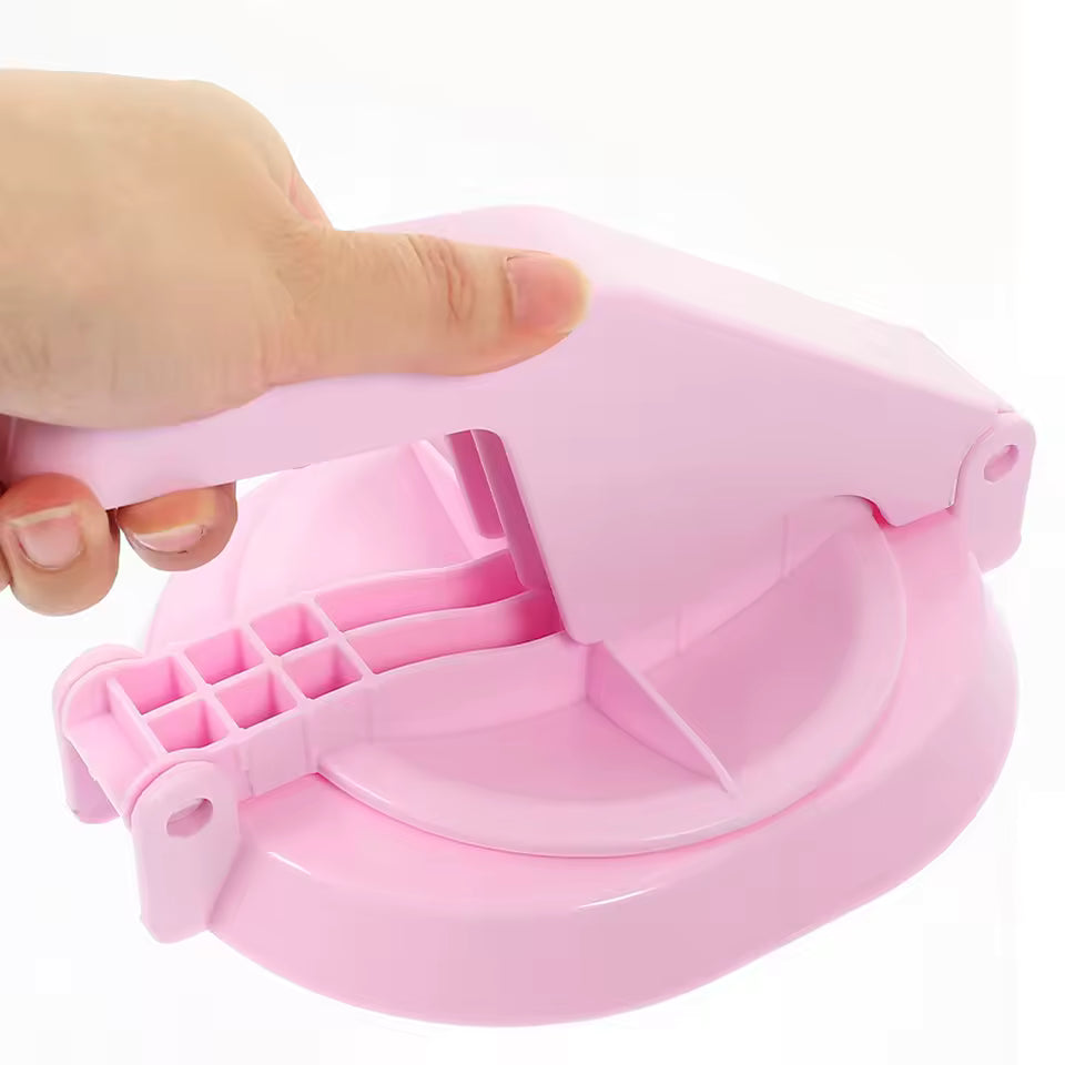 Hand pressing pink portable kitchen dumpling press making dumplings easily with Clarify.pk kitchen tool