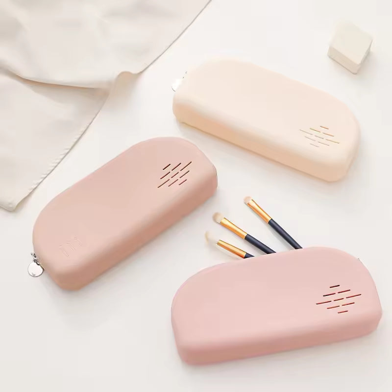 Clarify.pk silicone cosmetic bag set in soft pastel colors perfect as a portable makeup organizer