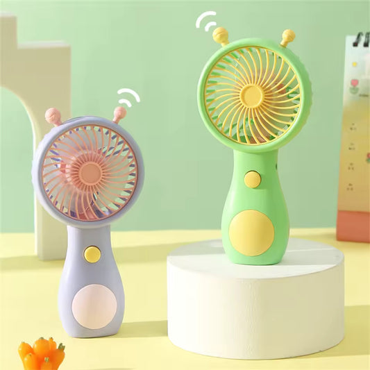 Portable mini fan USB rechargeable in green and purple with yellow buttons and antenna designs