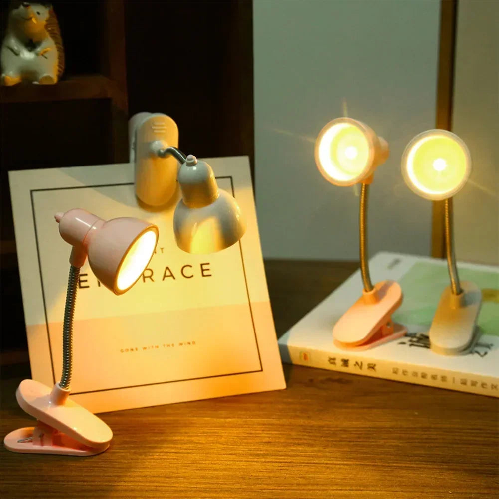 Clarify.pk portable mini night light with flexible neck and clip-on base in pink and white colors