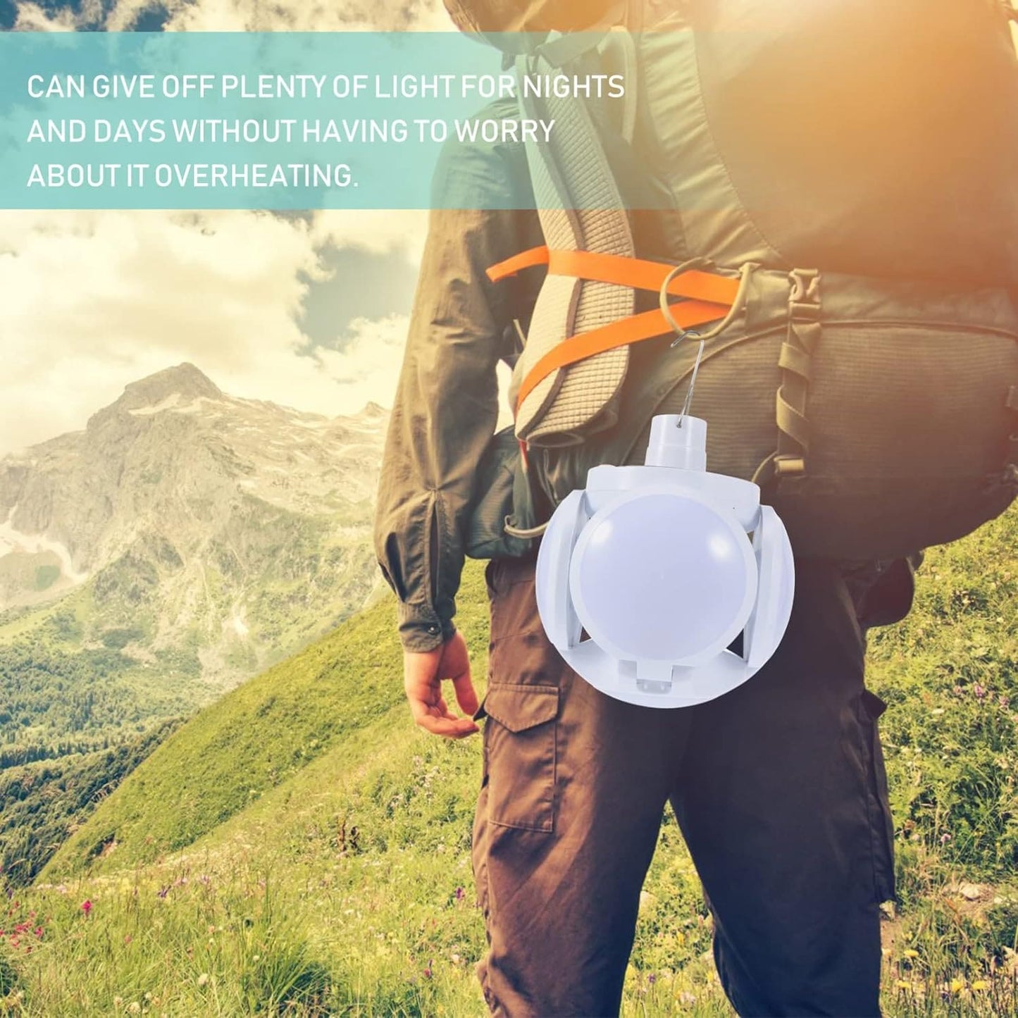 Portable rechargeable LED lantern hanging from backpack of hiker in mountainous outdoor setting
