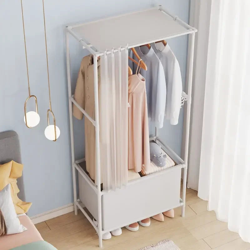 Clarify portable wardrobe closet folding rack with clothes hanging and shoe storage in bedroom