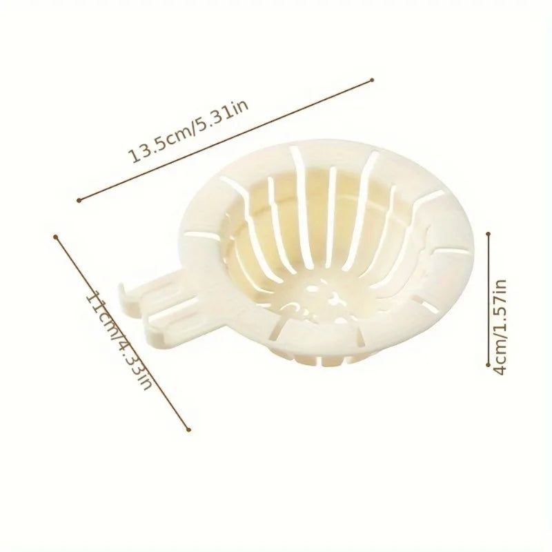 White rabbit drain basket strainer with slotted design and handle, measuring 5.31 by 4.33 by 1.57 inches