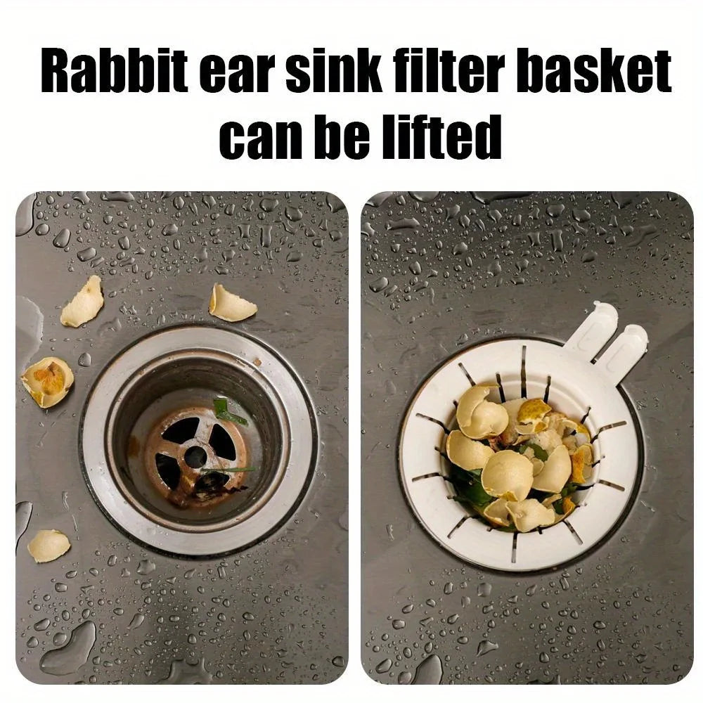 Rabbit drain basket strainer showing lifted white rabbit ear sink filter basket catching food debris in sink drain