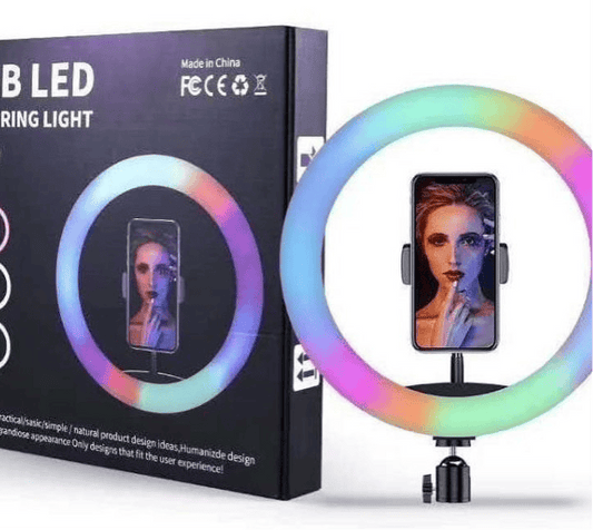 RGB ring light for makeup with phone holder displaying a woman applying makeup beside packaging box