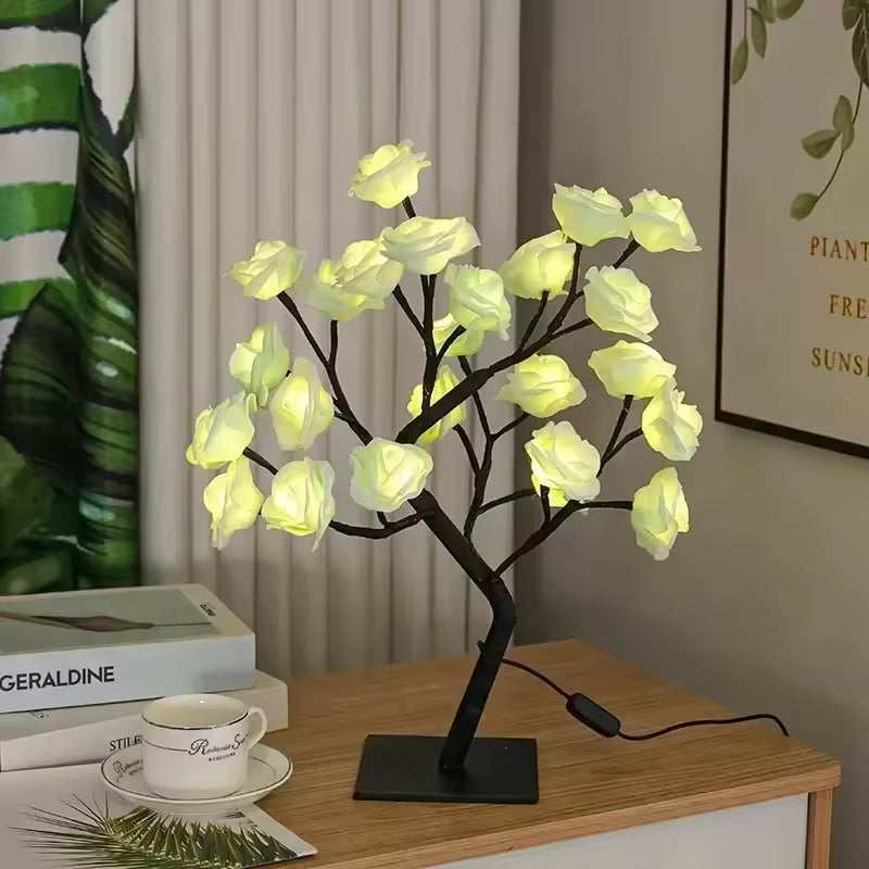 Clarify.pk rose LED lamp for home decor featuring artificial glowing flowers on a black stand