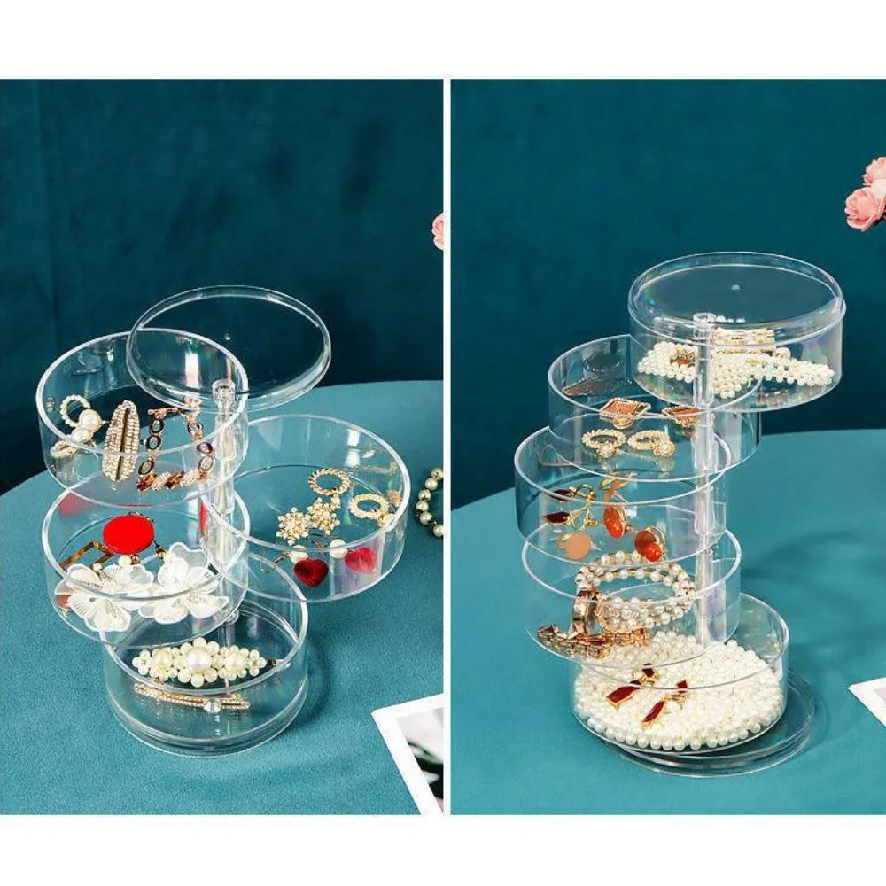 Clarify.pk transparent rotating jewelry storage box with multiple tiers holding earrings and bracelets