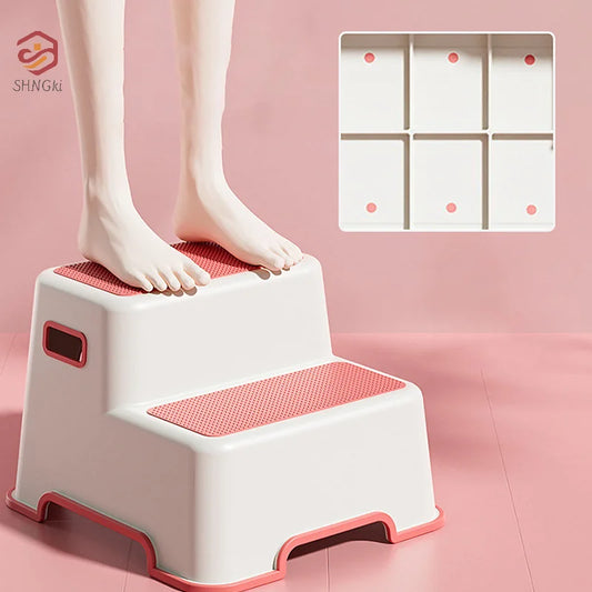 White and pink non-slip step stool for bathroom with textured grip surface and two steps