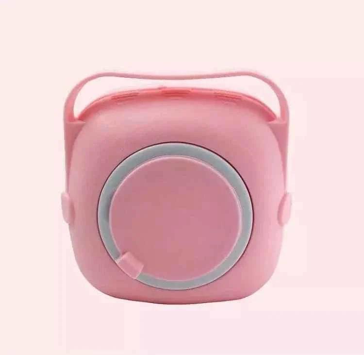 Pink silicone baby bath brush with ergonomic handle for gentle cleaning and easy grip
