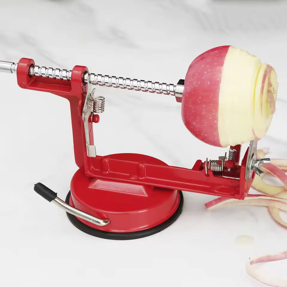 Clarify.pk red spiral vegetable slicer manual peeling an apple with a suction base for stability