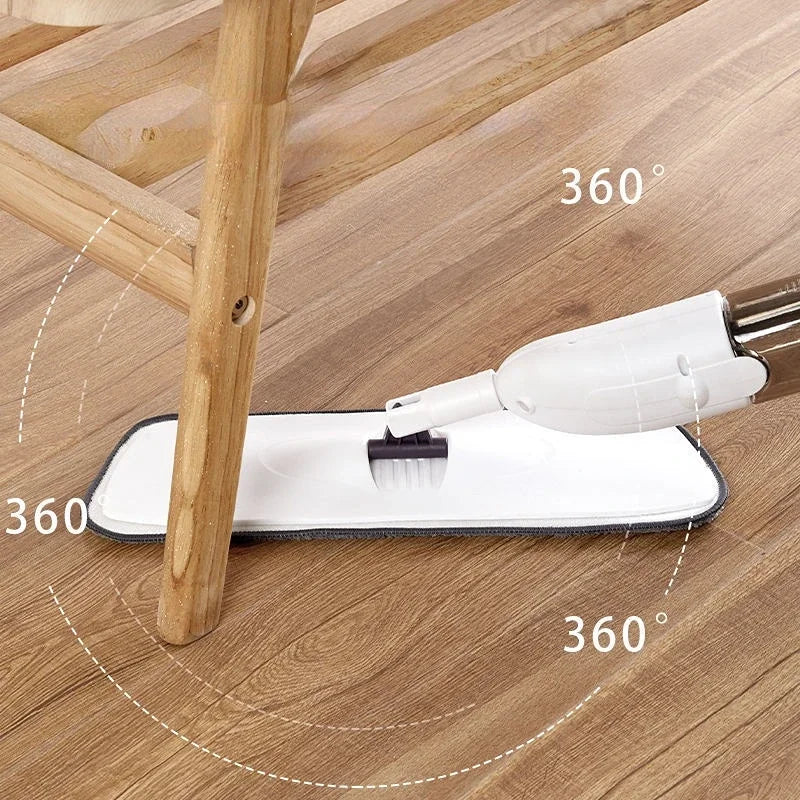 Clarify.pk white spray mop cleaning wooden floor around chair legs with 360 degree swivel head