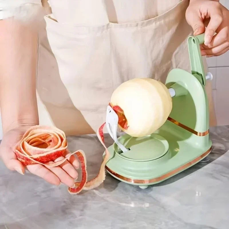 Stainless steel fruit peeler machine in green peeling an apple with spiral peel at Clarify.pk