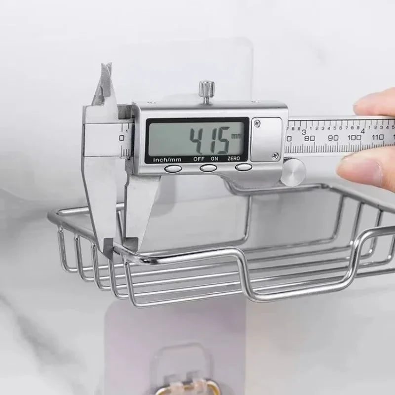 Measuring stainless steel soap dish with digital caliper showing 41.5 millimeters width