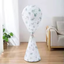 Stand fan protective cover with cute heart pattern fitting a tower fan in a living room