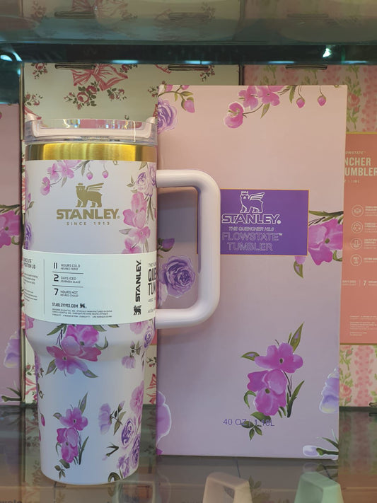 Stanley floral insulated tumbler with purple flower design and matching pink box packaging