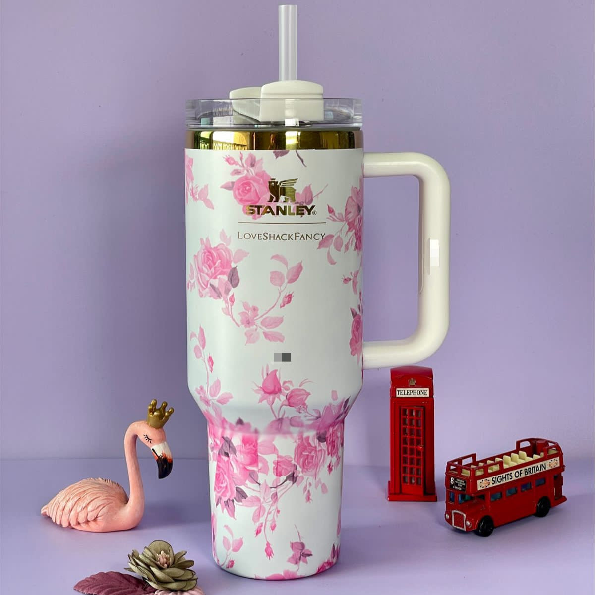 Clarify.pk stainless steel flower tumbler with pink floral design and handle for easy grip